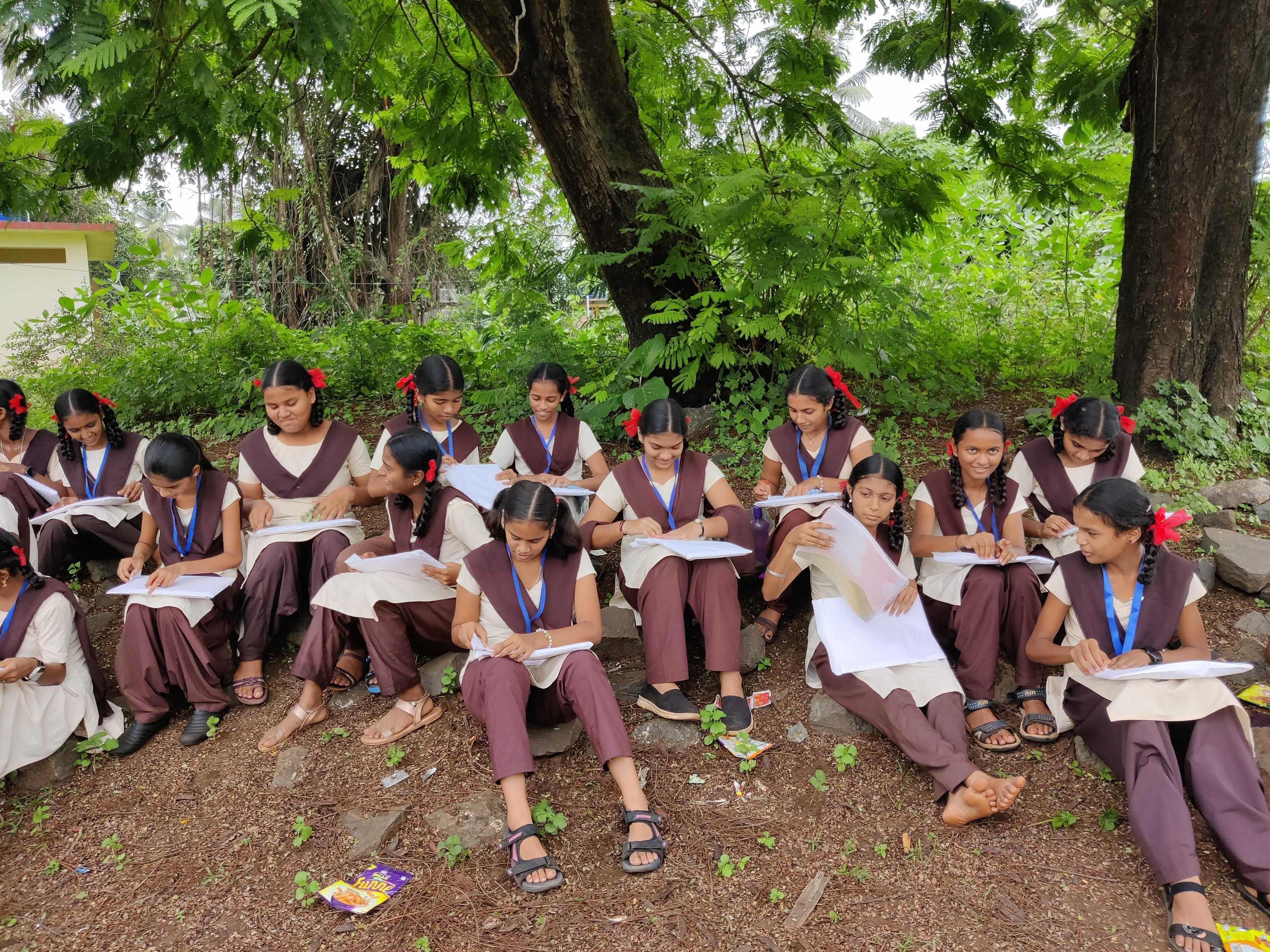 Adolescent Rural Indian Girls with Wysa Dreamkit Book