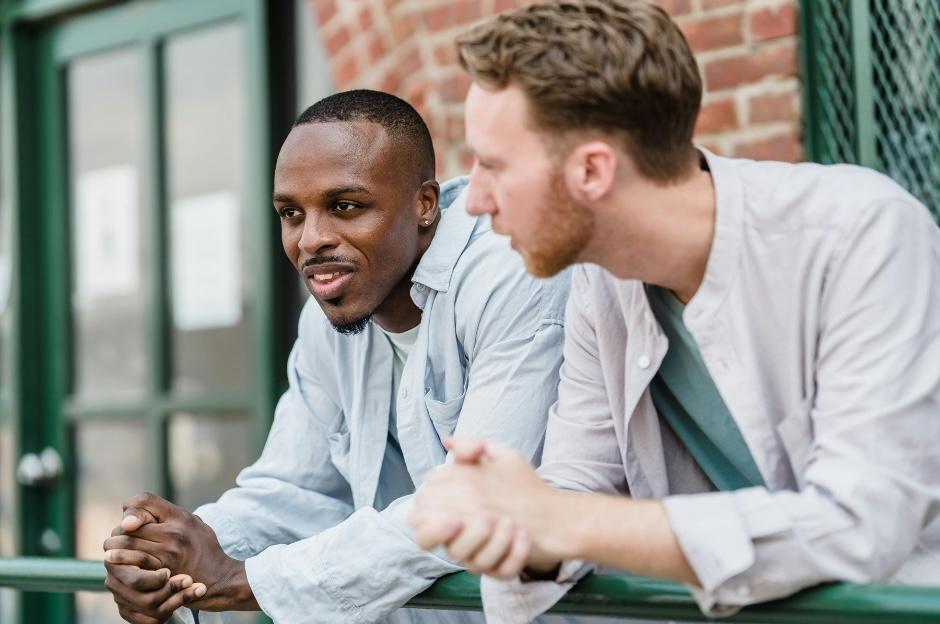 Two young men chatting